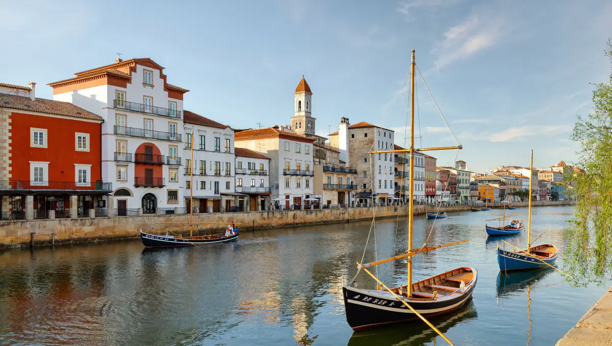 Vila Nova de Gaia riverfront with port cellars and rabelo boats