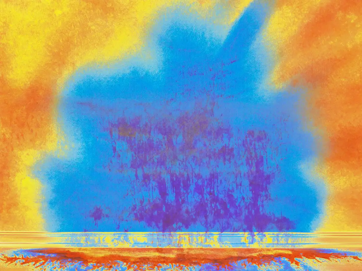 Infrared thermal image of a wall showing a cool damp patch spreading up from the floor